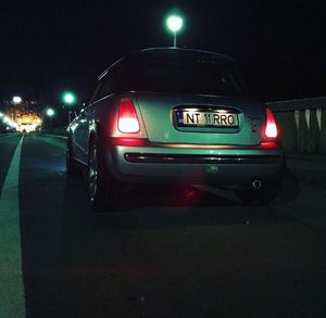 Car on street at night