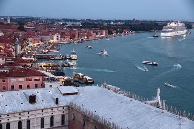 High angle view of townscape by sea