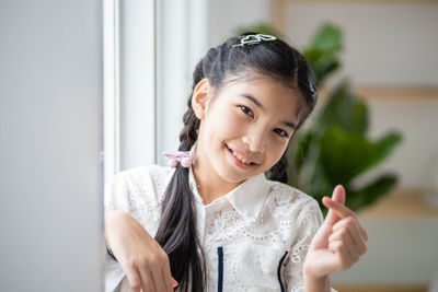 Portrait of a smiling woman at home