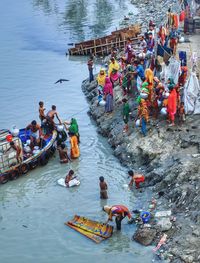 High angle view of people at river