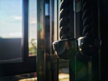 Close-up of wine glass against window