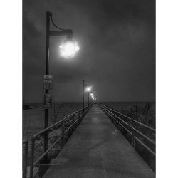 Street light against sky