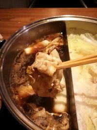 High angle view of meat in bowl on table