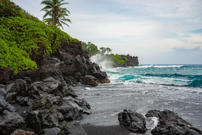 Scenic view of beach and sea against sky