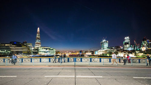 View of city lit up at night