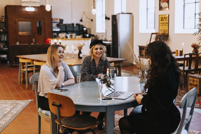 Group of people working on table