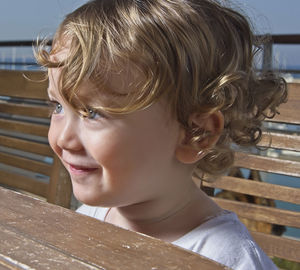 Close-up portrait of girl looking down