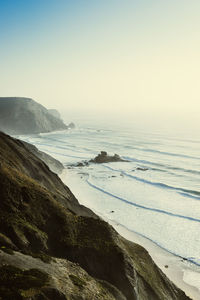 Scenic view of sea against clear sky