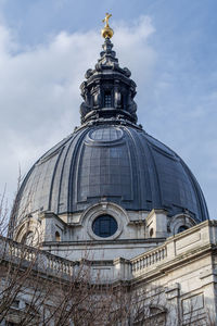 Low angle view of brompton oratory dome against sky