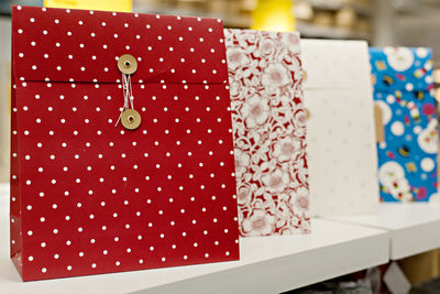 Close-up of gift bags on table in store