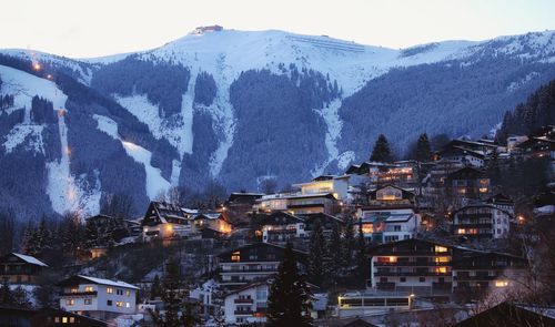 Aerial view of townscape against sky during winter