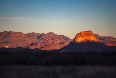 Scenic view of mountains against sky during sunset