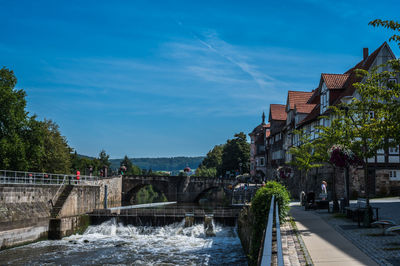 Bridge over river against sky