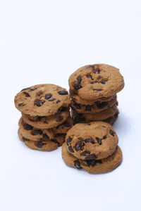 Close-up of cookies against white background