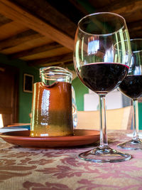 Close-up of wine in glass on table