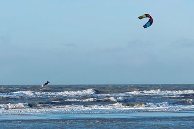 People flying over sea