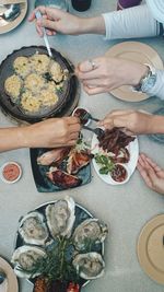 High angle view of man eating food