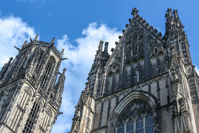 Low angle view of cathedral against blue sky