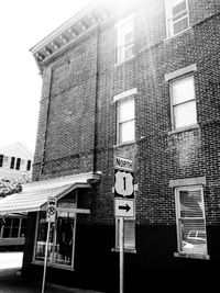 Low angle view of sign on building