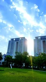 Buildings in city against sky