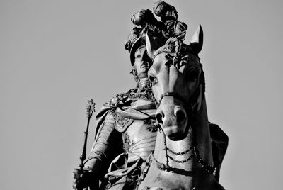 Low angle view of statue against clear sky