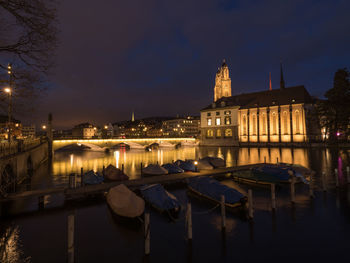 Reflection of buildings in water at night