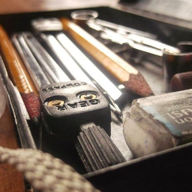 indoors, close-up, still life, selective focus, focus on foreground, large group of objects, metal, table, old, in a row, stack, equipment, no people, old-fashioned, wood - material, variation, music, group of objects, choice, retro styled