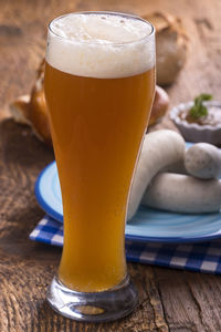 Close-up of beer glass on table