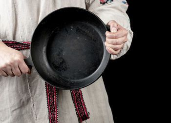 Midsection woman person holding frying pan