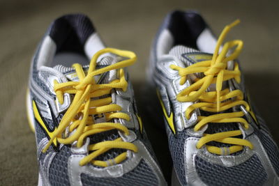 Close-up of shoes on table