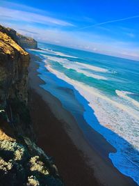 Scenic view of sea against blue sky