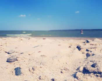 Surface level of beach against sky