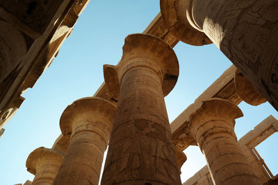 Low angle view of old ruins against clear sky