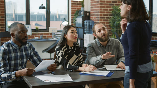 Business colleagues working at office