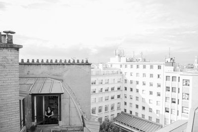 View of buildings in city against sky