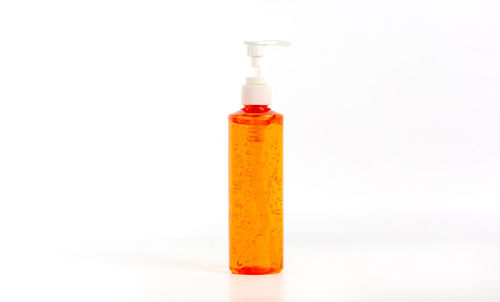 Close-up of bottle against white background