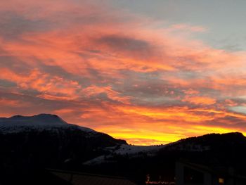 Scenic view of mountains at sunset