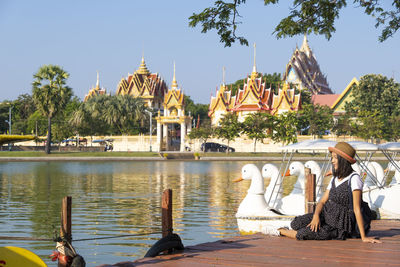 Panoramic view of temple and building against sky