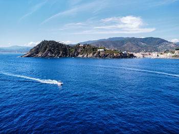 Aerial view with drone of ligurian sea and boat 