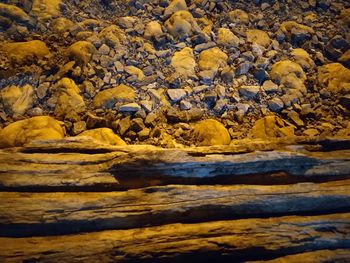Full frame shot of rocks by river