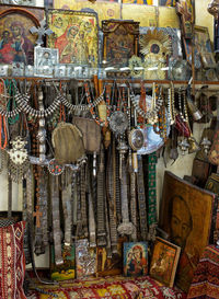 Clothes hanging for sale at market stall