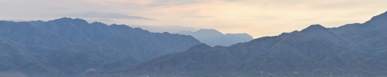 Panoramic view of mountains against sky