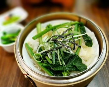 Close-up of noodles served on table