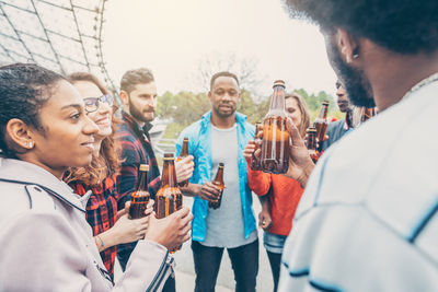 Group of people holding drinks