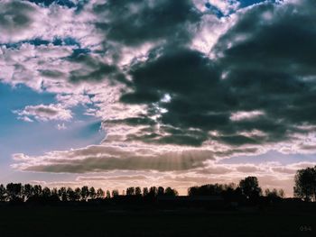 Scenic view of silhouette landscape against sky during sunset