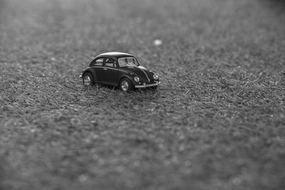 Close-up of toy car on field