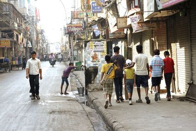 Man standing on city street