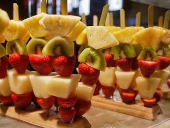 Close-up of chopped fruits on table