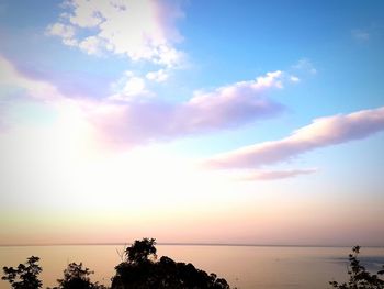 Scenic view of sea against sky at sunset