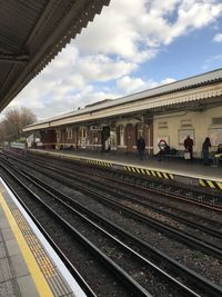 Railroad station platform against sky